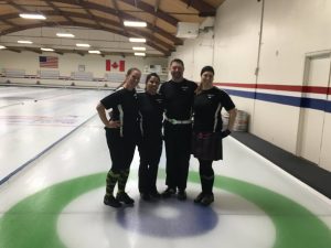 4 curlers standing together