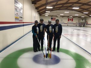 4 curlers standing together